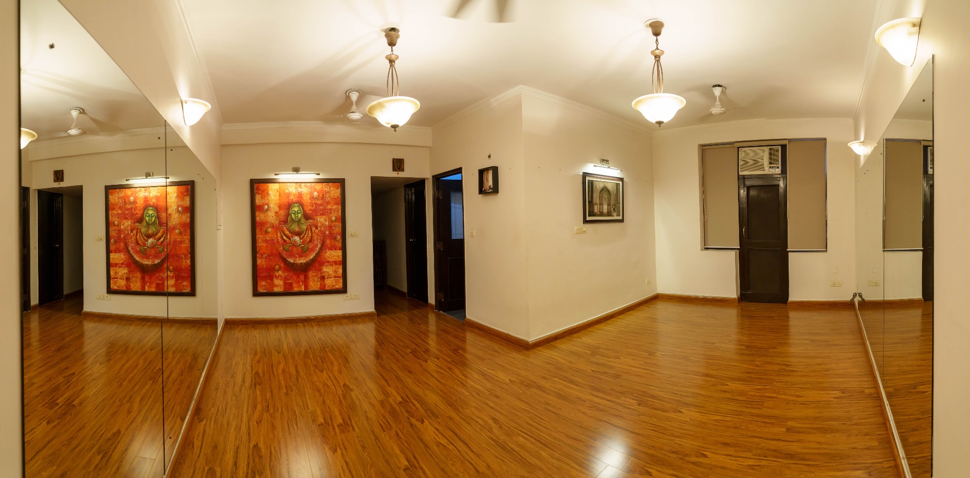 The Ibadat studio with the lotus painting on the wall